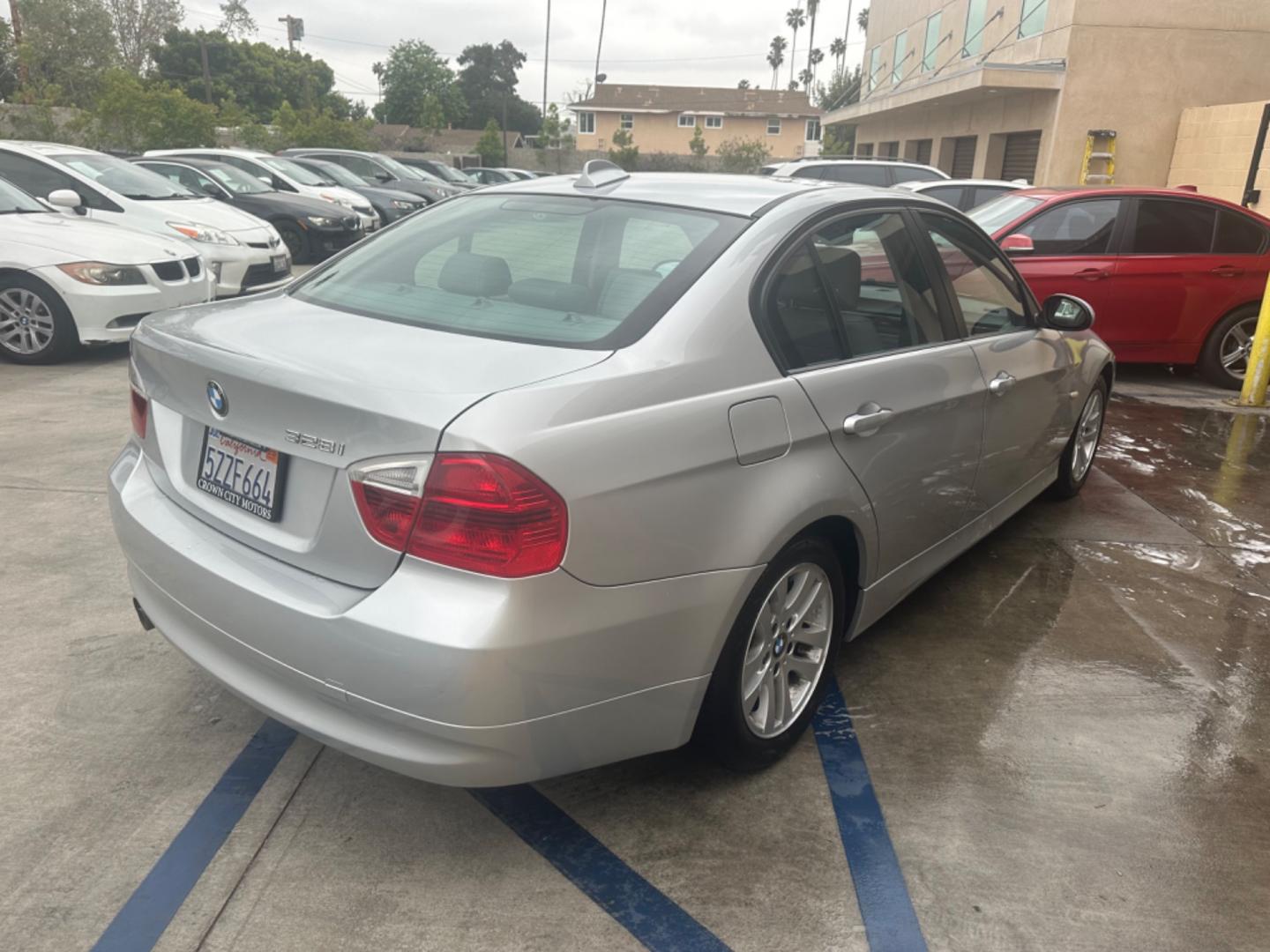 2007 Silver Metallic /Gray BMW 3-Series Leather (WBAVC53597F) with an 6 cylinder engine, Automatic transmission, located at 30 S. Berkeley Avenue, Pasadena, CA, 91107, (626) 248-7567, 34.145447, -118.109398 - "Discover Unmatched Value: 2007 BMW 328i at Our Pasadena Dealership" Are you in the market for a pre-owned vehicle that blends luxury, performance, and affordability seamlessly? Look no further than our esteemed dealership in Pasadena, CA, where we present to you the exquisite 2007 BMW 328i. Wit - Photo#6